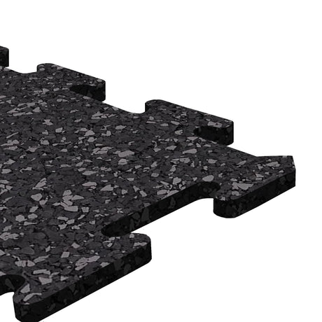 A mostly dark gray colored Ecore Athletic interlocking rubber gym flooring tile for homes