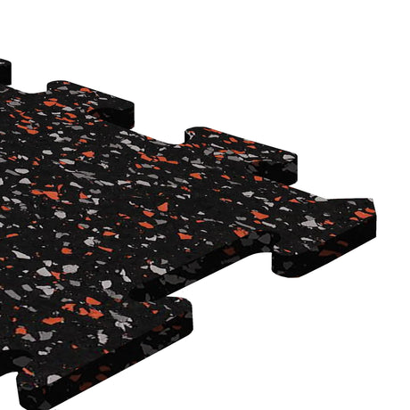 A black, orange, and gray colored Ecore Athletic interlocking rubber gym flooring tile for homes